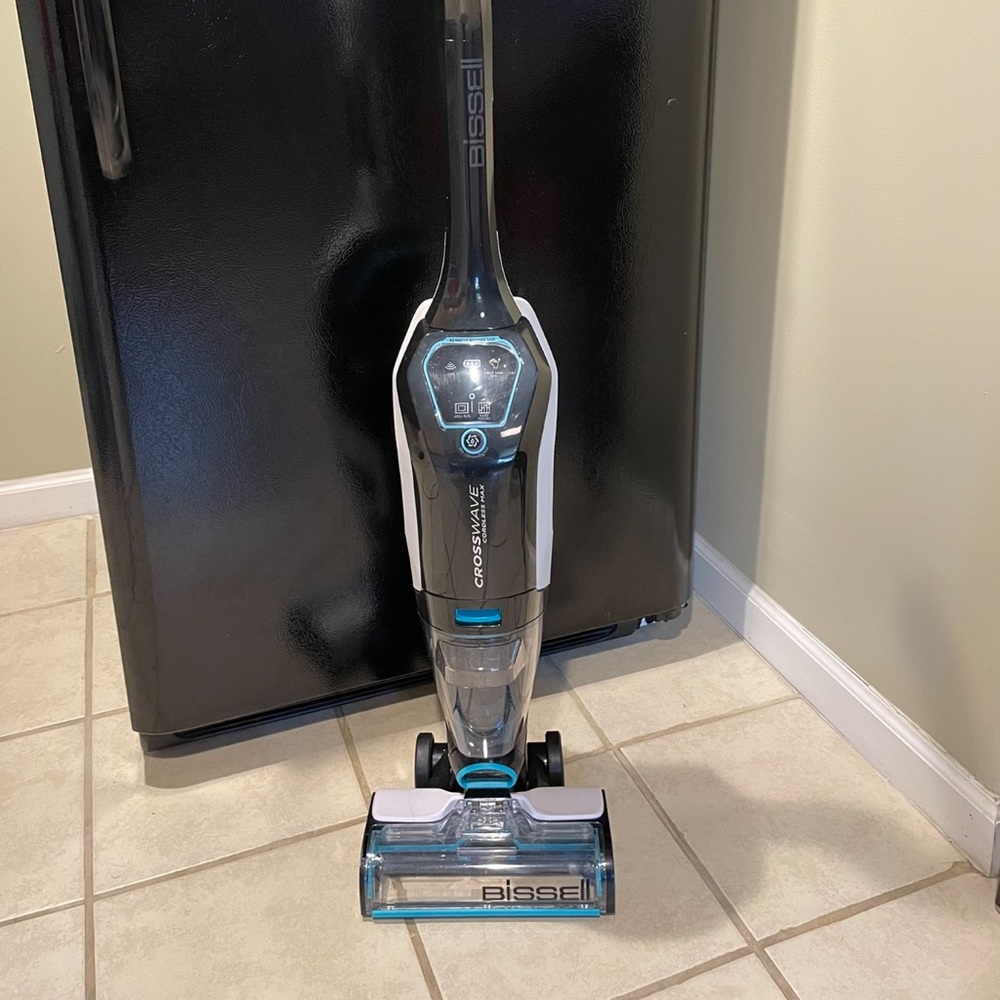 Multi-surface cleaning, cord free, WiFi connected, bagless technology, two tank.